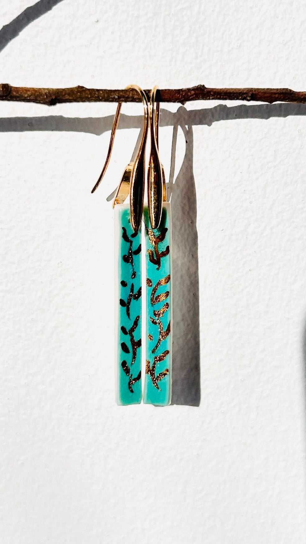 Porcelain long earrings gold leaves