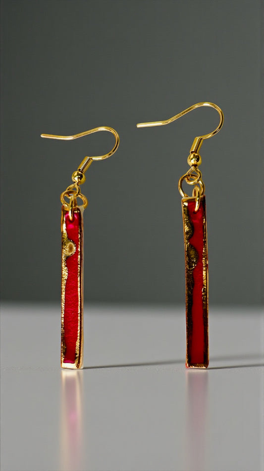 Long red porcelain earrings with 22 k gold luster